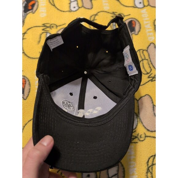 GE Olympic World Wide Partner Adjustable Black Strapback Hat - Picture 5 of 7